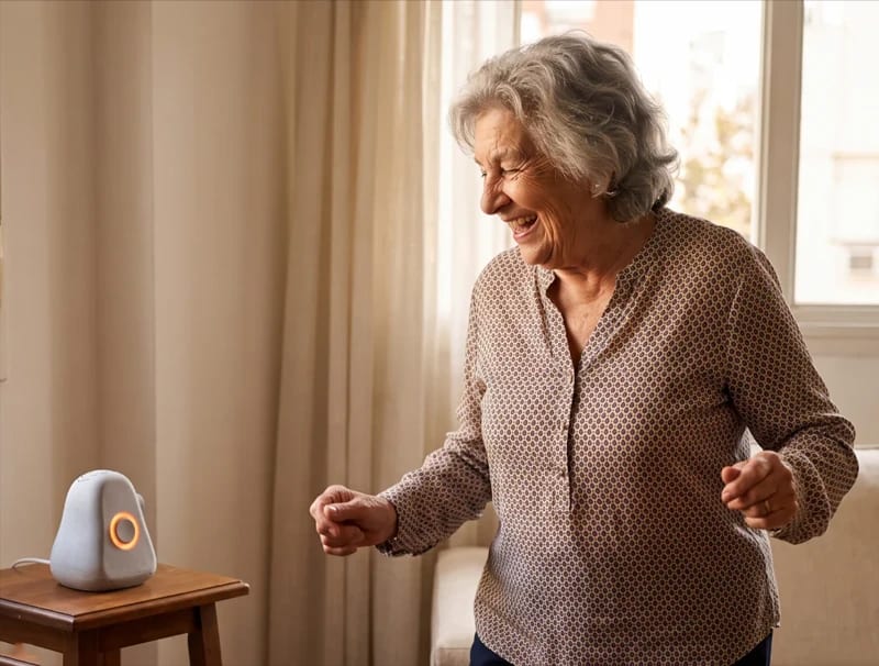 Older adult listening to voice-controlled radio with Ato